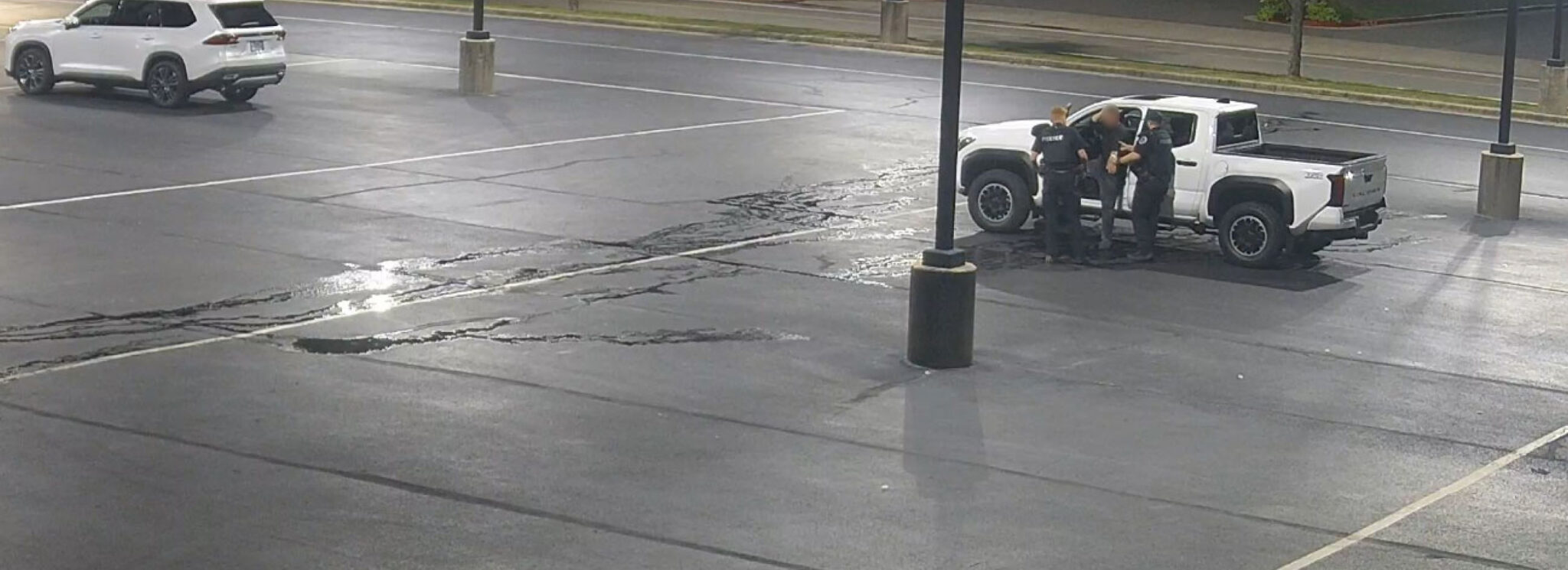 person arrested after vehicle break-in at dealership