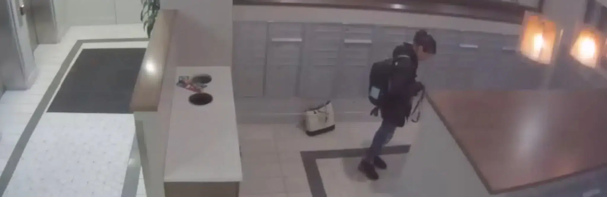 Denver apartment mailroom intruder arrested