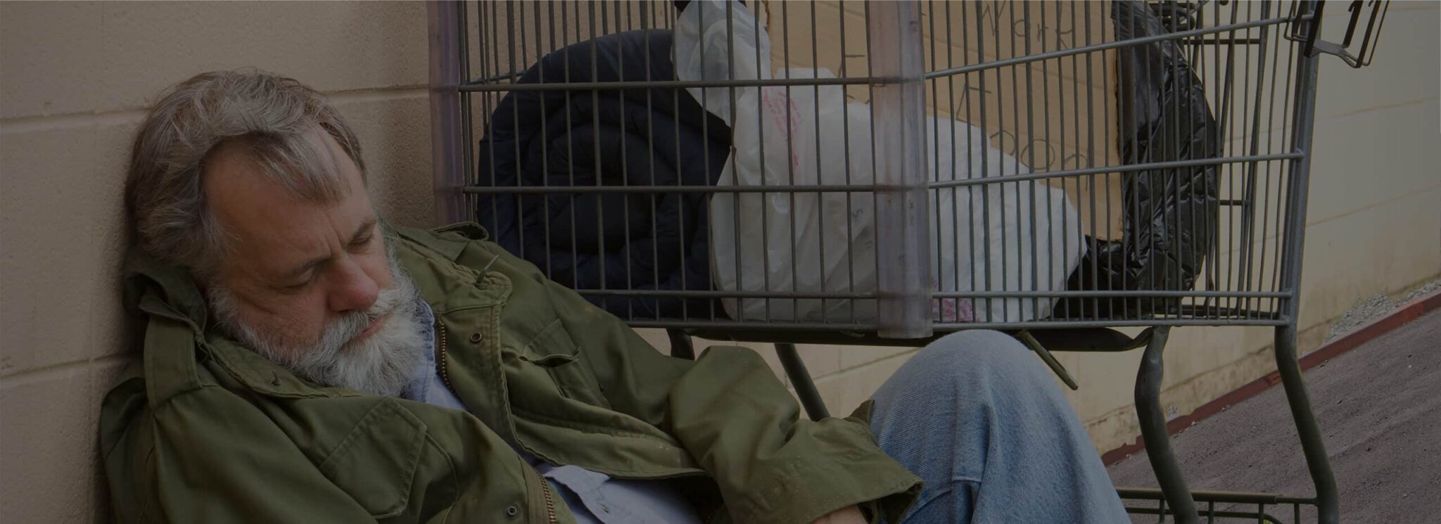 Homeless Man Sleeping in Dumpster video hero scaled 1
