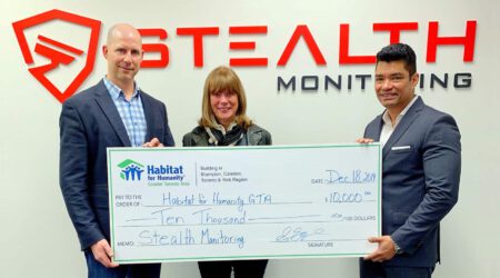 ECAM Presents Check to Habitat for Humanity hero scaled 1