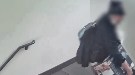 Suspicious Individual Caught Lurking in Apartment Stairwell Hero