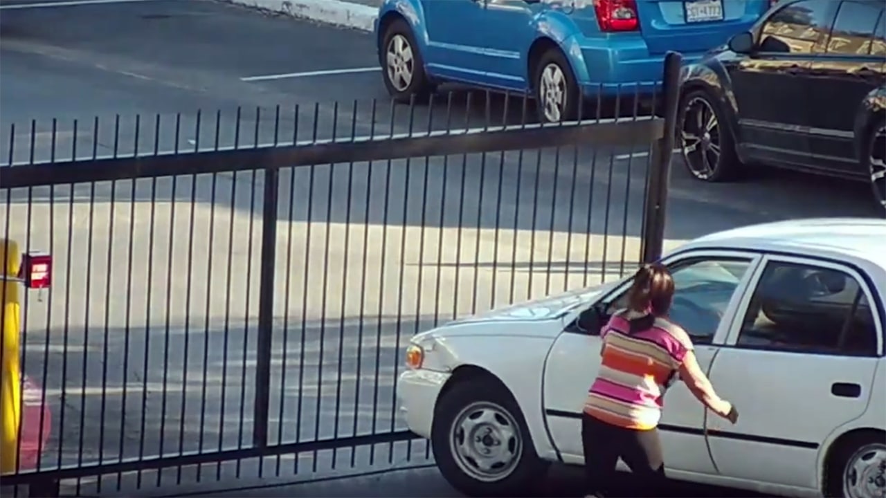 Woman Smashes Into Apartment Access Gate