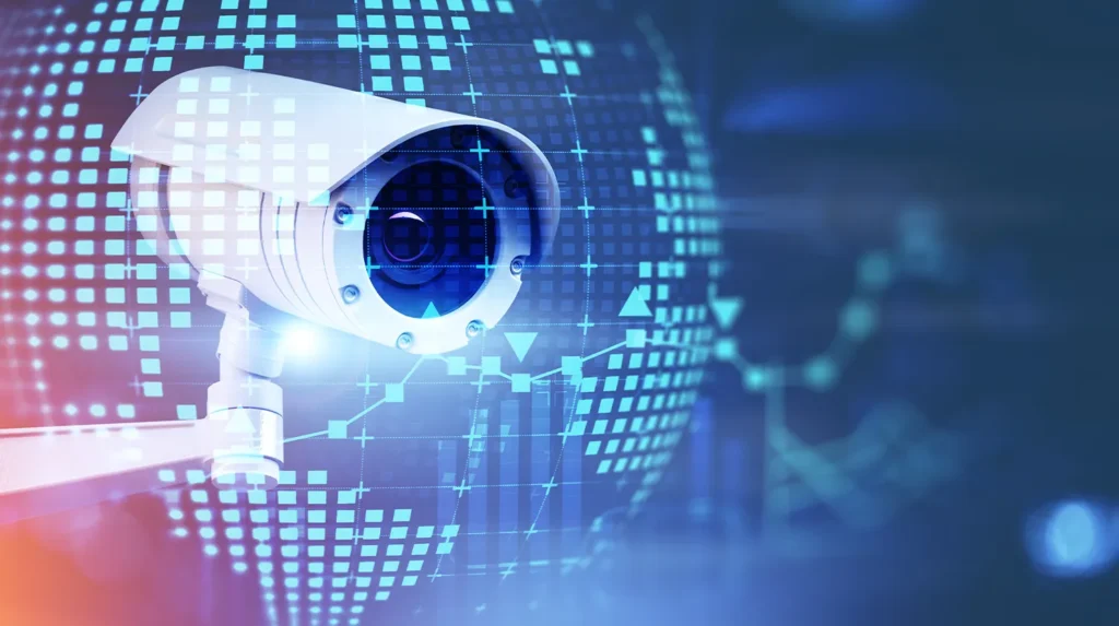 A security camera and a computer-generated image of a globe showing CCTV meaning