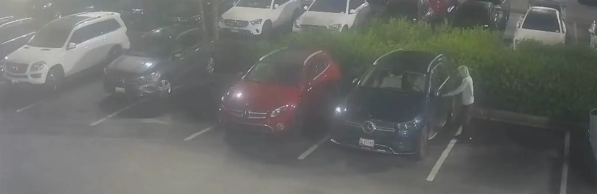 parking lot security cameras catch intruder at dealership