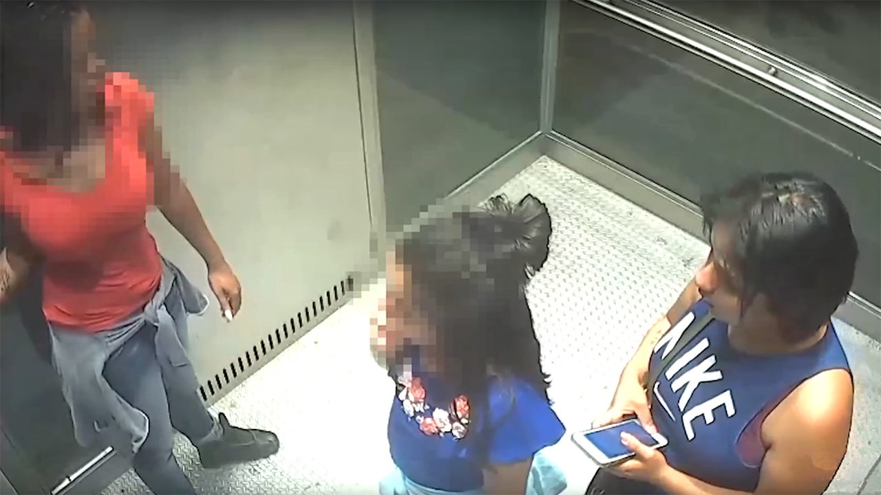 women stuck in elevator listimage